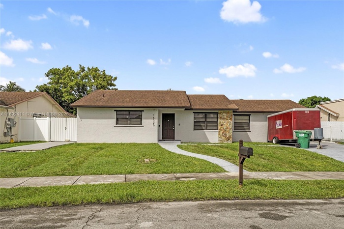 Front view — property divided into three independent living areas, ideal for income generation.