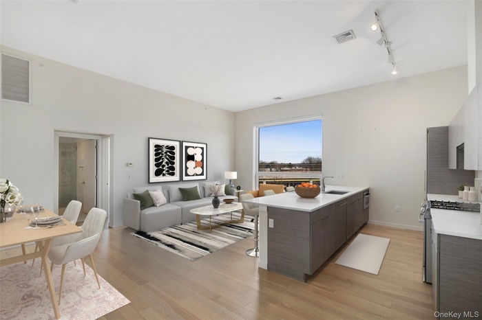 *Photos of alternate unit in the building with the same finishes. Views/layout differs per unit*