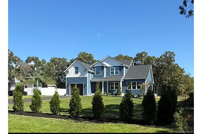 View of front facade featuring board and batten siding