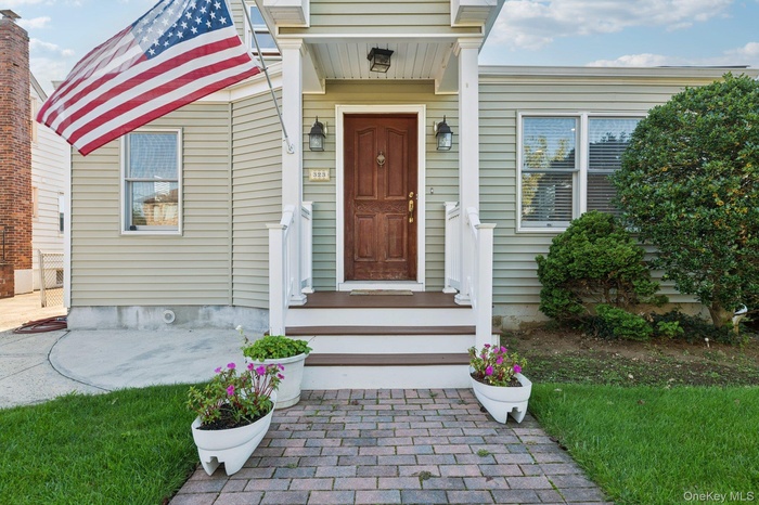Entrance to property with a patio area