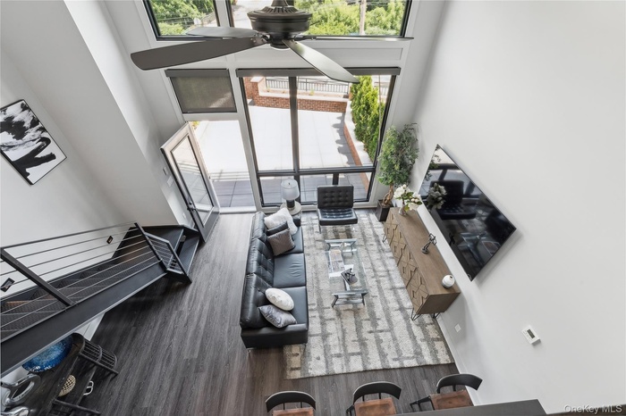 Living area featuring wood finished floors and plenty of natural light