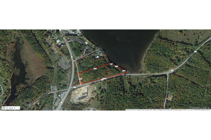 Aerial view of property's location with property parcel outlined
