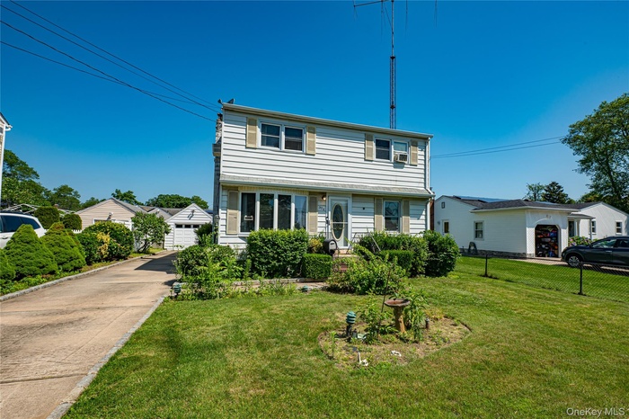 from the front door you can go up the stairs or enter the main floor living room