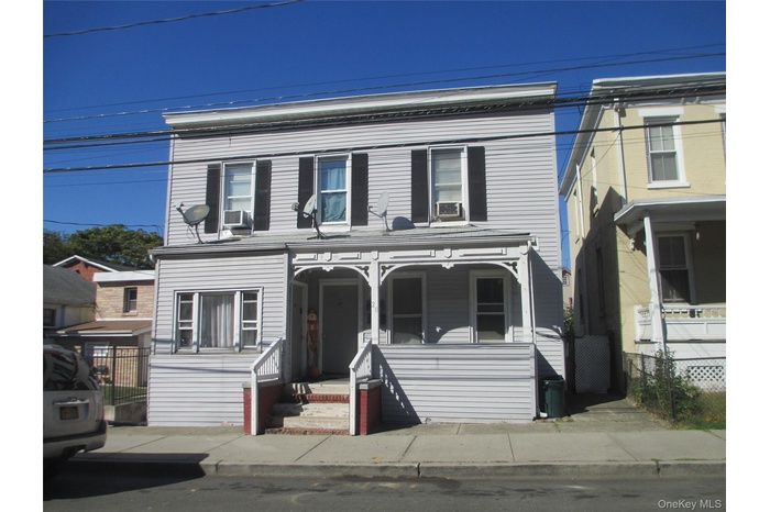 View of front facade featuring a porch