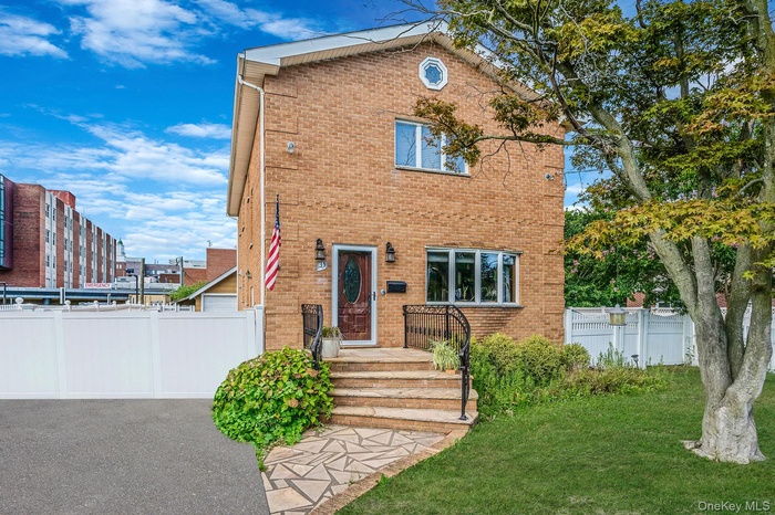 View of front of home with brick siding