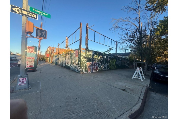 View of road featuring curbs and sidewalks