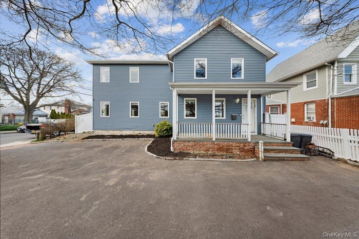 View of front facade featuring covered porch