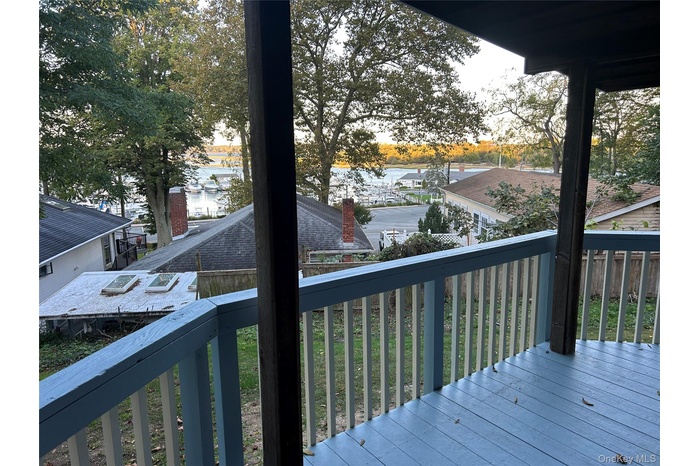 Wooden terrace with a water view