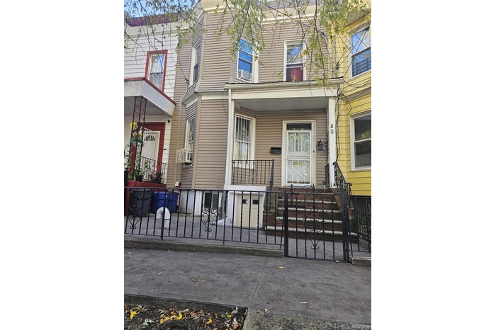 View of exterior entry featuring a gate