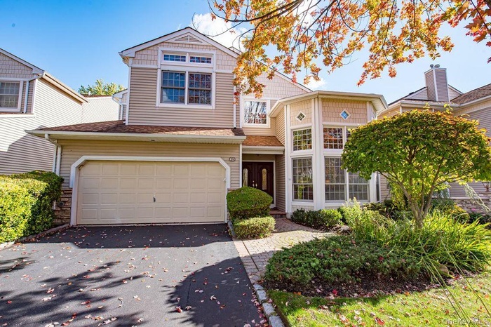 Detached Home with First floor Primary Suite, 2 car garage and basement
