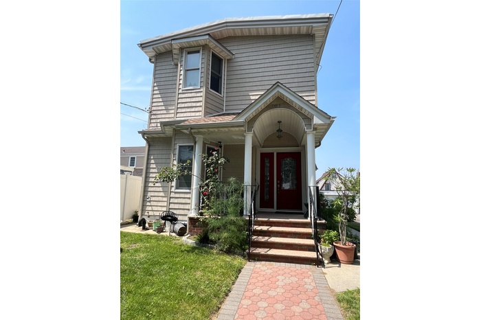 View of front of home with covered porch