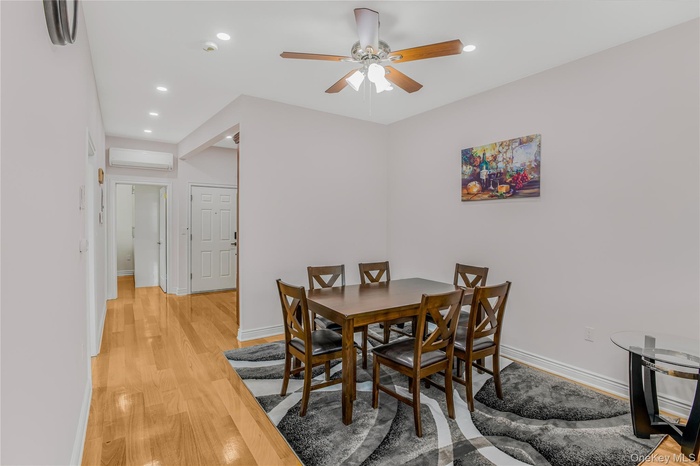 Dining space featuring light wood-type flooring, recessed lighting, and ceiling fan