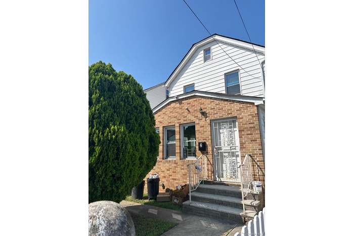 View of front facade with brick siding