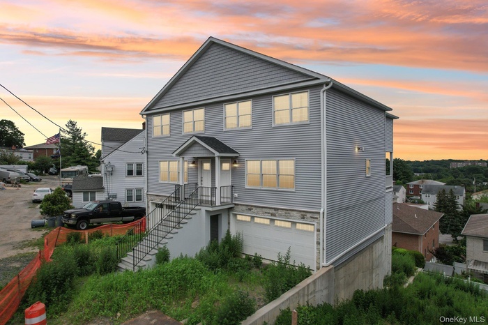 View of front facade with an attached garage