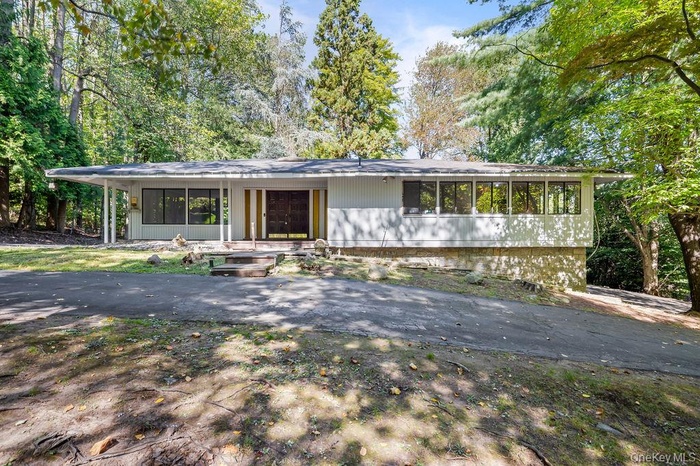 View of front of house featuring covered porch