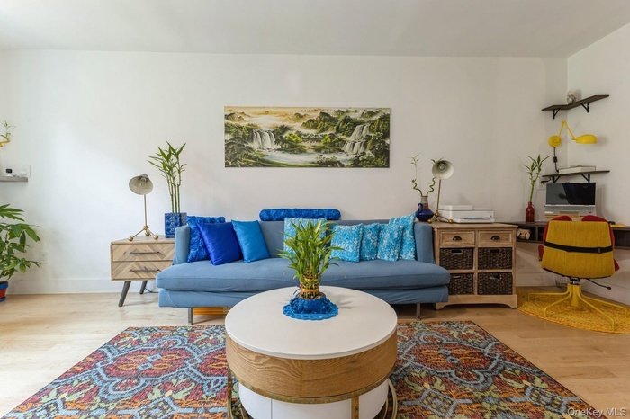 Living room featuring wood finished floors