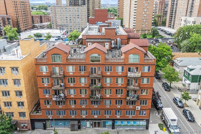 View of apartment building / complex featuring a city view