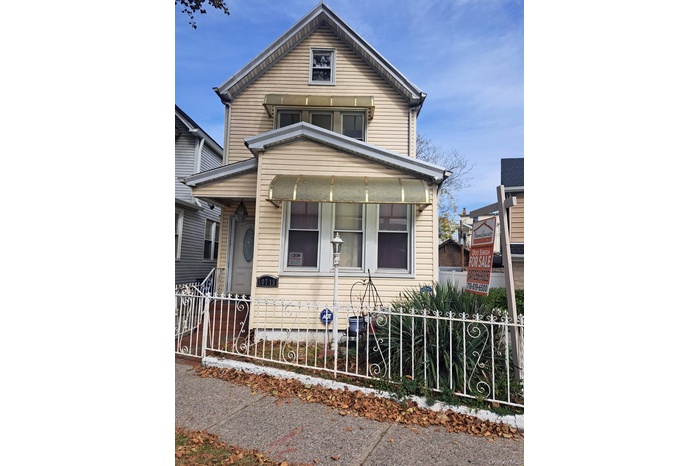 View of front of property featuring covered porch
