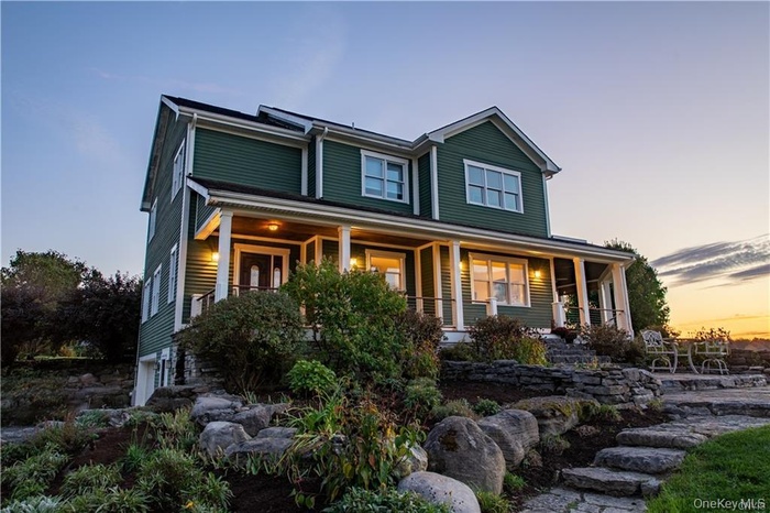 View of front of home featuring covered porch