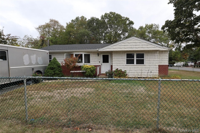 View of front of home with a fenced front yard