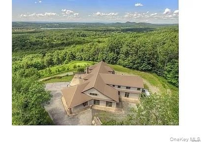 SPECTACULAR Western VIEWS of the beaucolic Warwick Valley and beyond! This EXCLUSIVE private 13 acre estate is one of a kind!