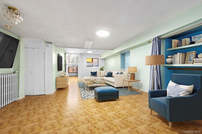 Living area featuring baseboards