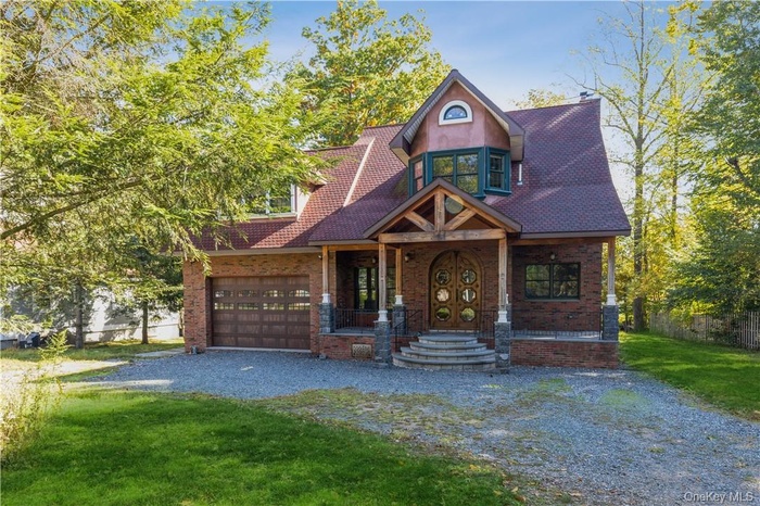 Stunning custom lakefront retreat situated on 1.5 acres