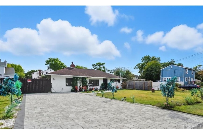 Ranch-style home with a chimney