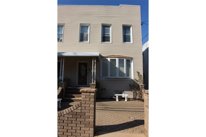 View of front facade featuring a patio