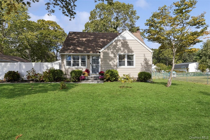 View of front of house with a chimney