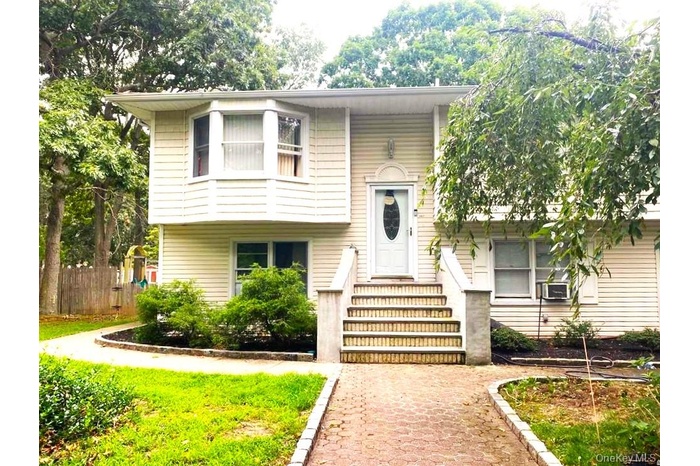 Bi-level home with cooling unit