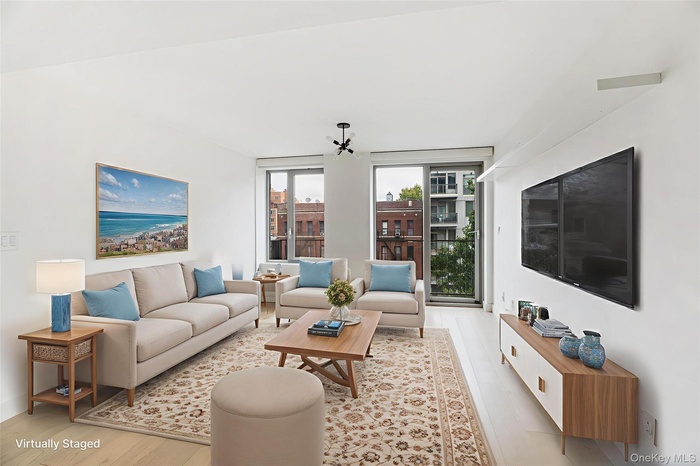 Living area featuring light wood-style flooring