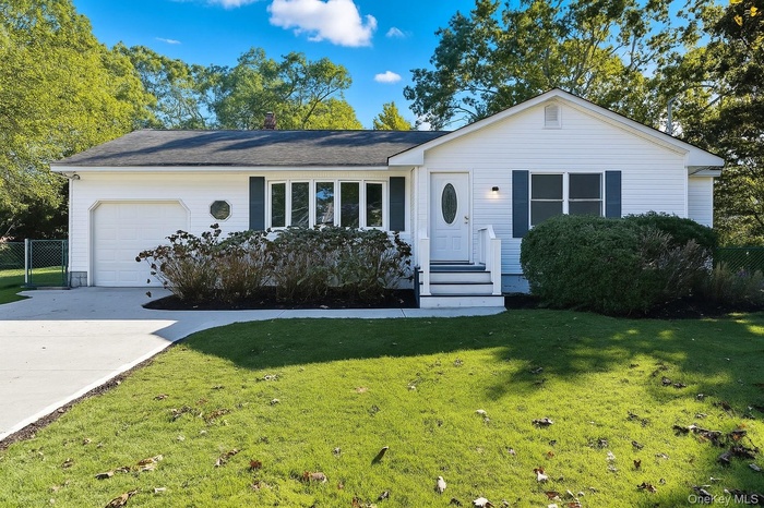 View of front of home featuring an attached garage