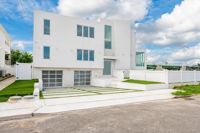 View of front of property featuring stucco siding