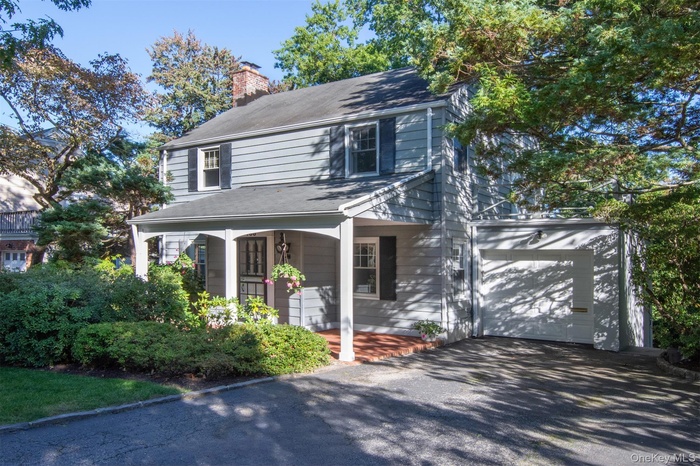 This classic Colonial projects a welcoming quality that is difficult to resist!