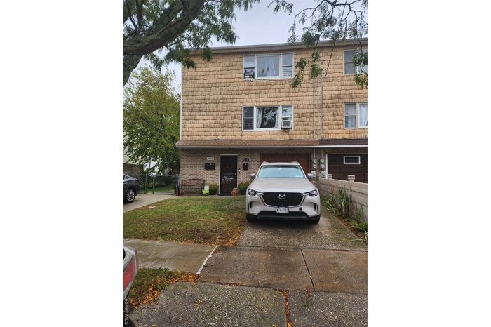 View of front of house featuring driveway