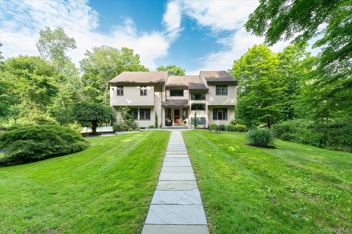 View of front of property with a front lawn