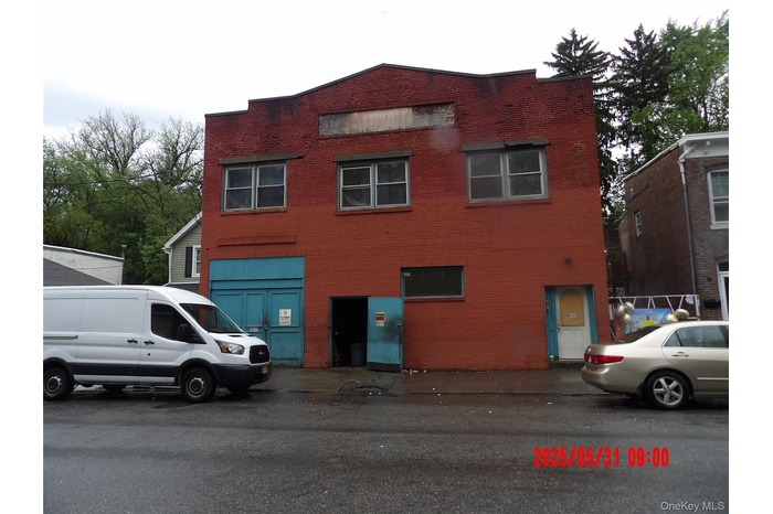 View of front of home with brick siding