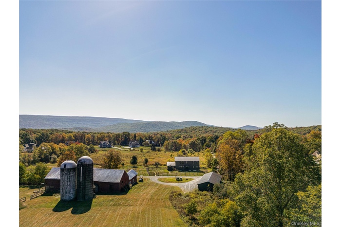 View of mountain background featuring a heavily wooded area