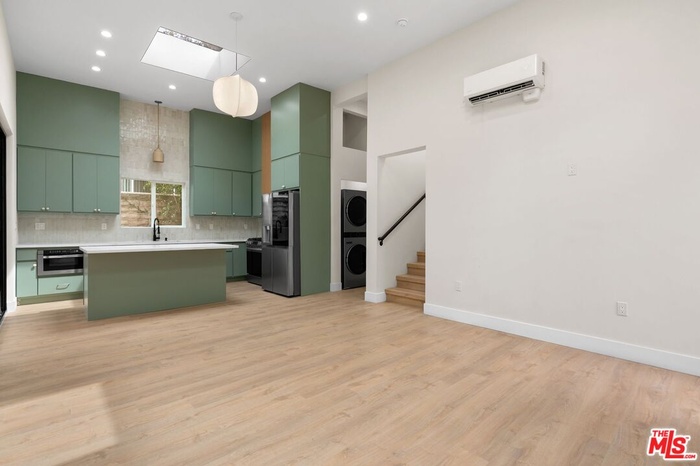 Kitchen opens to Living