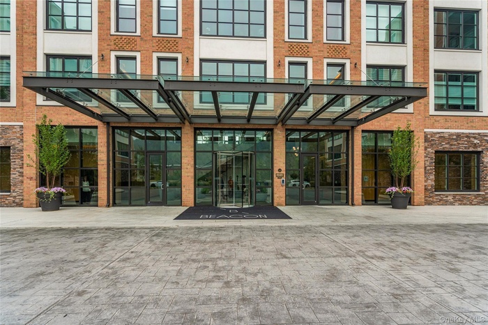 Property entrance with brick siding