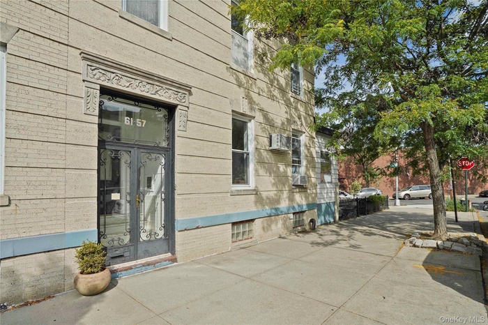 View of side of property featuring french doors