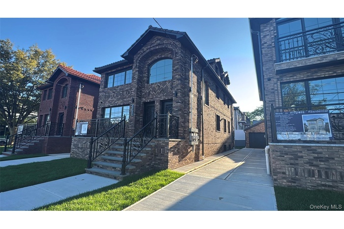 View of front of home with brick siding