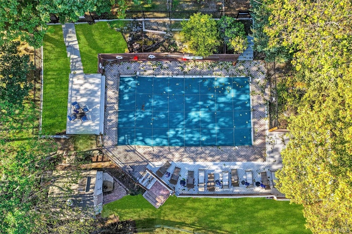 It's never too soon to start planning for the summer!  Commnity pool is sequestered into a private and tranquil woded setting.  Just bring your towel 