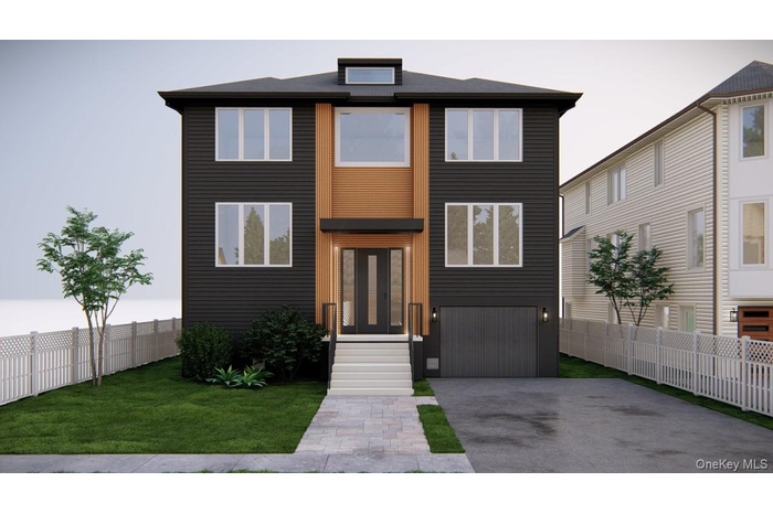 Modern home with driveway and an attached garage