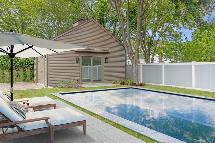 View of swimming pool featuring a patio
