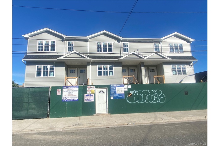 View of front of house with a fenced front yard