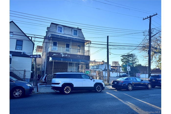 View of front facade with mansard roof