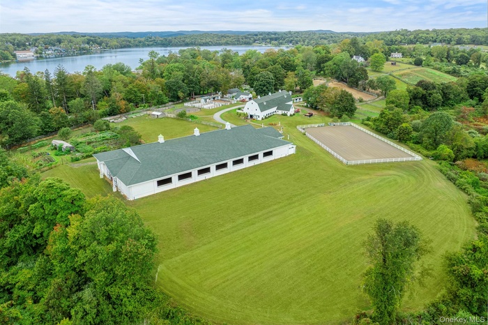 View of Farm with Peach Lake in background.