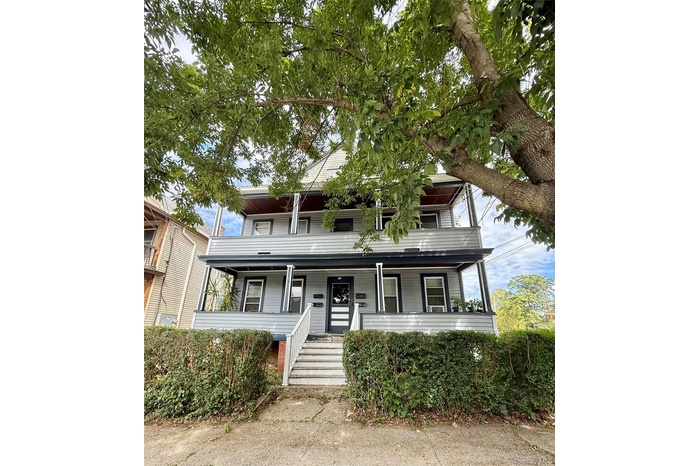 View of front of property featuring covered porch